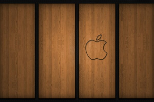 Signo de Apple sobre fondo de madera