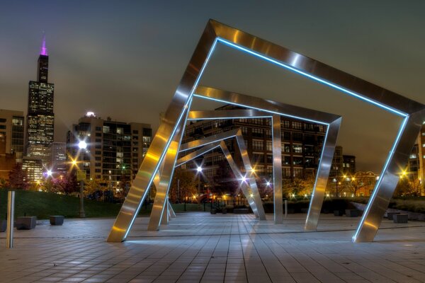 Parque nocturno, arquitectura y luces de la ciudad. UU.