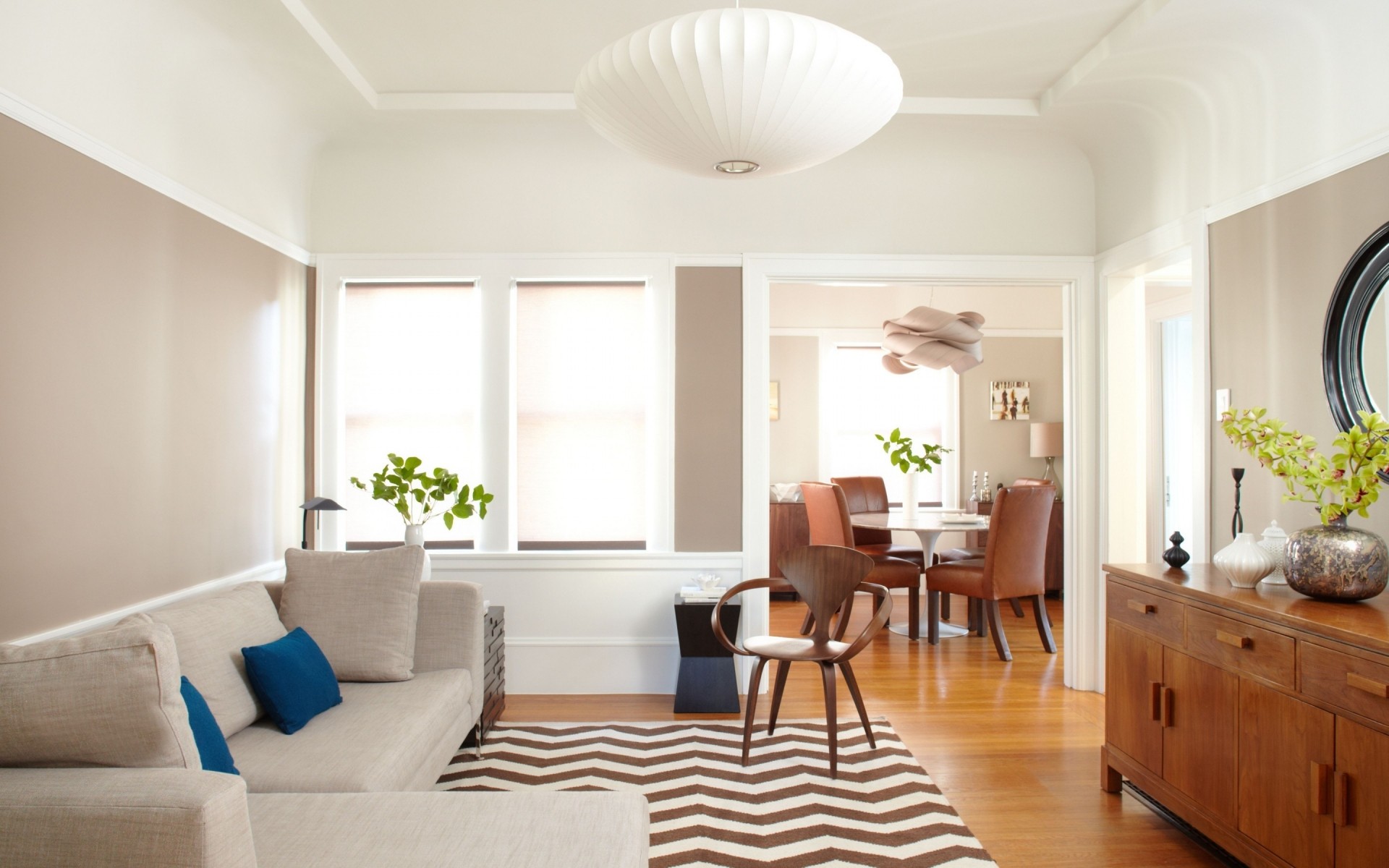 habitación muebles interior sofá asiento silla mesa diseño de interiores piso ventana alfombra moderno casa hogar familia lámpara apartamento lujo espacioso techo sala de estar sala de estar