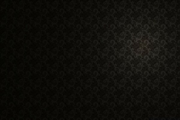 Patrón calado sobre fondo negro
