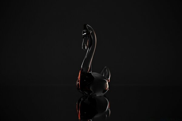 Cisne negro en un Escritorio oscuro