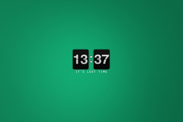 Reloj electrónico sobre fondo verde