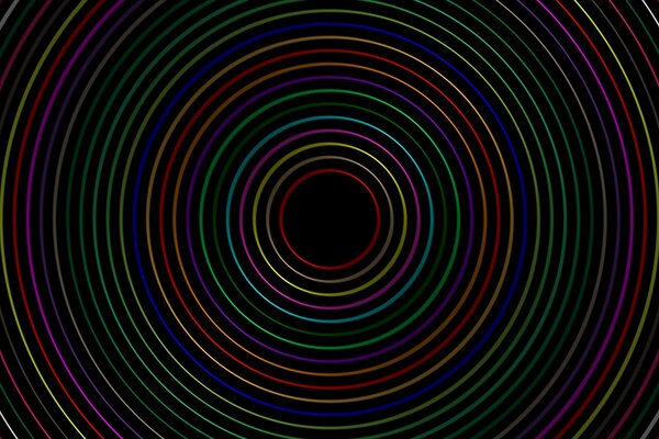 Escritorio círculos de colores sobre fondo negro