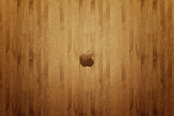 Logotipo de Apple en la superficie de madera