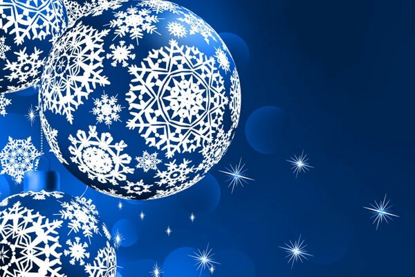 Juguetes de Navidad pintados con copos de nieve