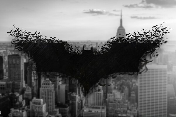 El emblema de Batman en el fondo de la ciudad
